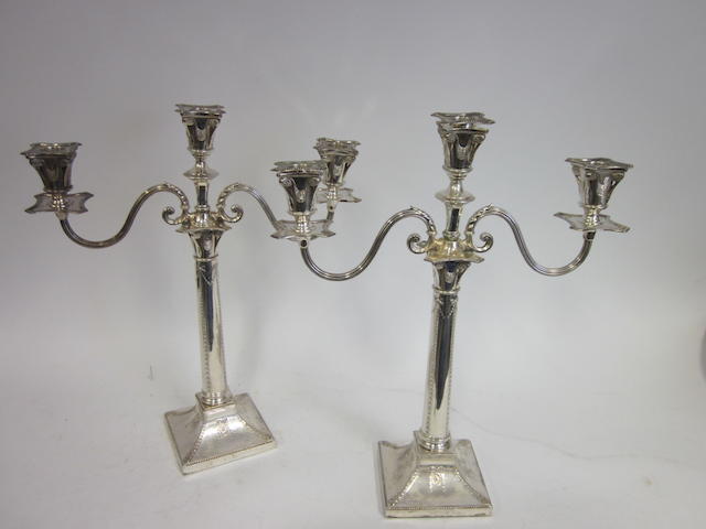 A pair of two-branch three light candelabra, by Turner Bradbury, London 1895, marks rubbed  (2)