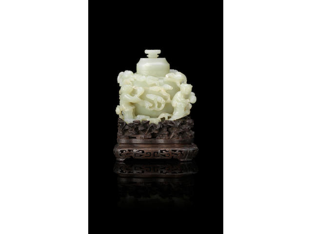 An exceptional Imperial white jade 'Dragon and Hehe Erxian' vase and cover Qianlong