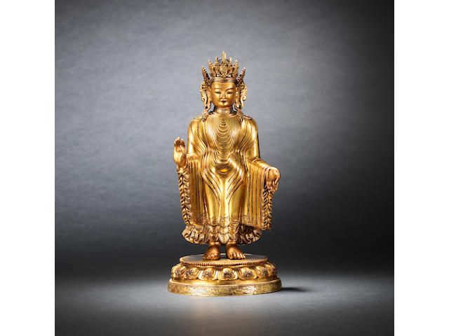 A magnificent and extremely rare gilt-lacquered bronze figure of Dipankara Buddha Qianlong
