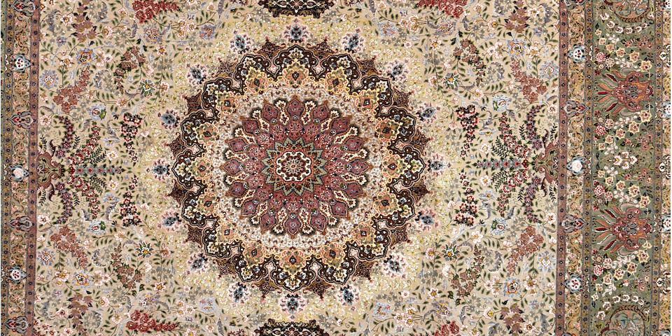 A large Tabriz carpet, North West Persia, 494cm x 350cm