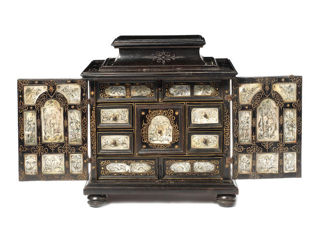 A 17th century Dutch ebony-veneered and engraved mother-of-pearl table or spice cabinet, possibly Amsterdamthe engraving in the manner of Jan Bellekin (Amsterdam, fl. 1600 - 1625)