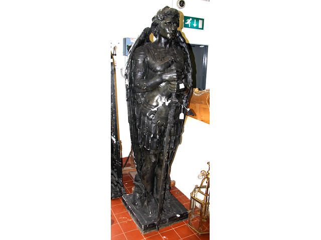 A black painted figure of St George,