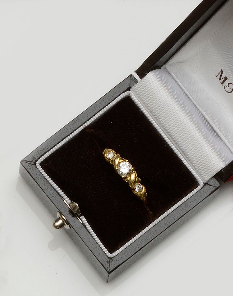 A diamond three stone ring