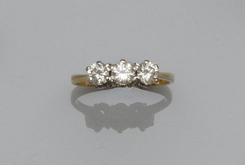 A diamond three stone ring