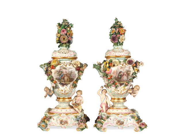 A pair of Meissen vases, covers and stands, mid to late 19th century