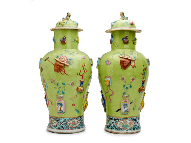 A pair of Chinese 'Hundred Antiques' famille rose baluster vases and covers 19th Century