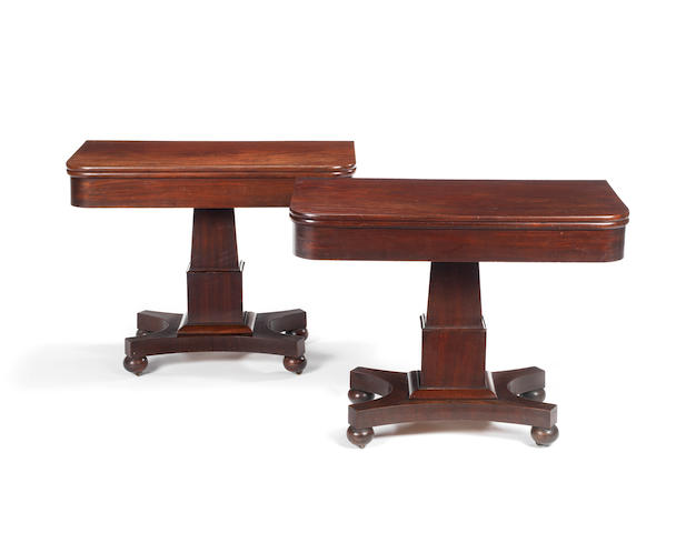 A pair of William IV mahogany tea tables