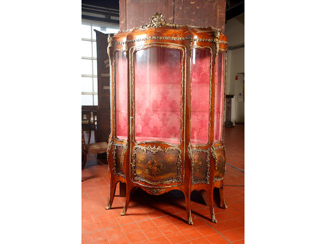 An unusual late 19th century French, Louis XV style, walnut veneered and  gilt metal mounted vitrine with 5 glass panels