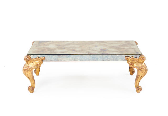 A French mid 20th century giltwood and mirror glass coffee table