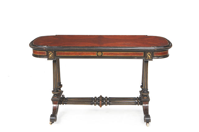 A mid Victorian amboyna, ebonised and ivory inlaid side table
