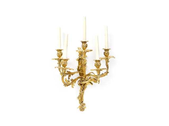 A set of four 20th century gilt brass five light wall appliquesin the Louis XV style