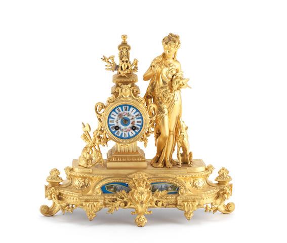 A late 19th century French gilt spelter and porcelain mounted figural mantel clockthe movement stamped Japy Freres