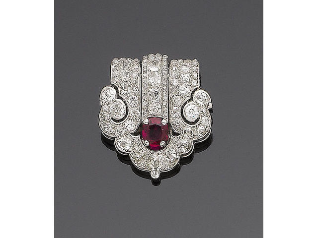 An art deco ruby and diamond clip brooch, by Cartier,
