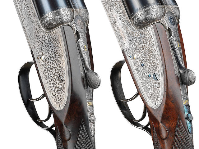A matched pair of 12-bore 'Royal' sidelock ejector guns by Holland & Holland, no. 27166 /27179 With a Holland & Holland brass-mounted oak and leather single-guncase (for gun No. 27166) and a J. Purdey leather motor-case with a Holland & Holland trade-label