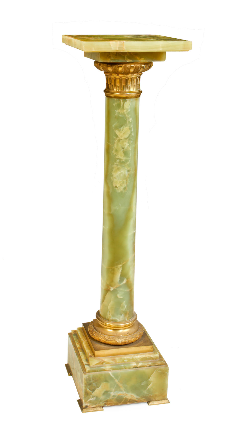 A late 19th/early 20th century green onyx and brass mounted pedestal column