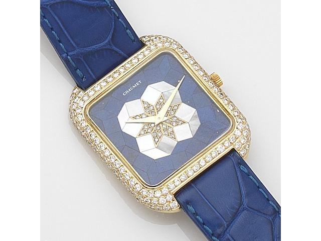 Vacheron & Constantin. An 18ct gold and diamond set automatic wristwatch with lapis lazuli and mother of pearl dialRetailed by Chaumet, Ref:2636 RE, Case No.528542PP, Movement No.884489, Circa 1980