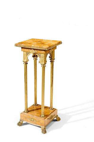 A gilt brass and Sienna marble jardiniere stand