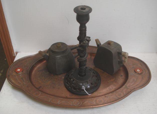A Chinese bronze candlestick, the column entwined with a dragon, 25cm, and other Chinese metalware, to include a shaped oval copper tray set with two discs, 46.5cm, two pewter teapots with calligraphic inscriptions and other items.