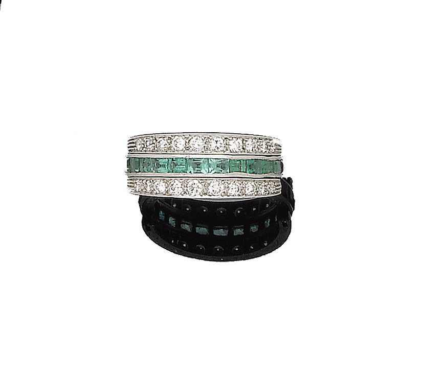 An emerald, ruby and diamond swivel ring