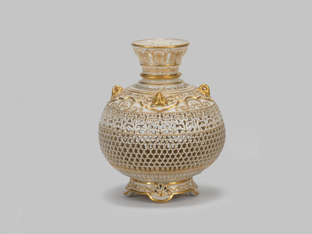 A good Royal Worcester reticulated vase by George Owen, dated 1919