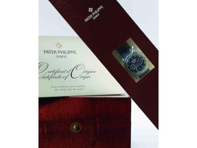 Patek Philippe. A fine and rare PT950 platinum and diamond set perpetual calendar chronograph manual wind wristwatch with moon phasesRef:3970EP, Case No.4225244, Movement No.3047133, Sold in May 2004, STILL SEALED IN ITS ORIGINAL PATEK PHILIPPE PAPER PACKAGING AND PLASTIC