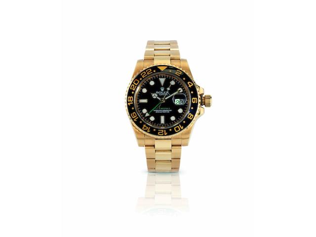 Rolex. A fine and rare 18ct gold dual time zone calendar automatic bracelet watchGMT Master II, Ref:116718, Case No.Z240159, Movement No.30987131 Circa 2006