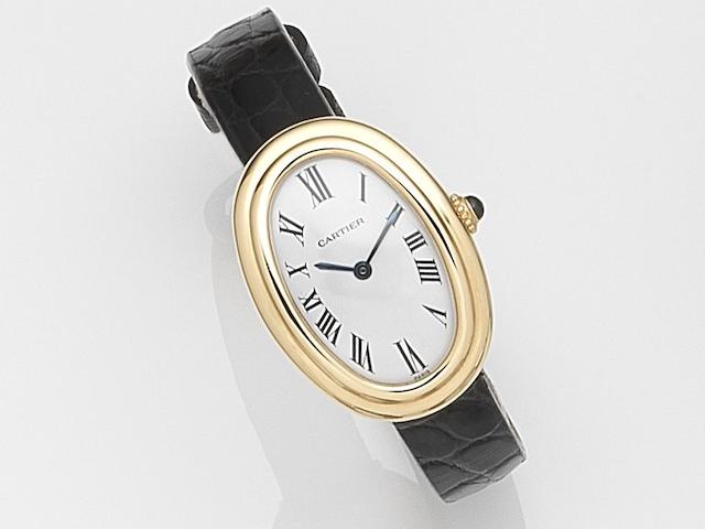 Cartier. A lady's 18ct gold manual wind wristwatch Baignoire, Case No.780942999, Circa 2000
