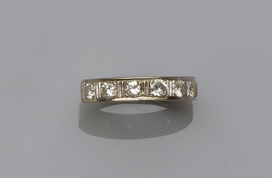 A diamond half hoop ring