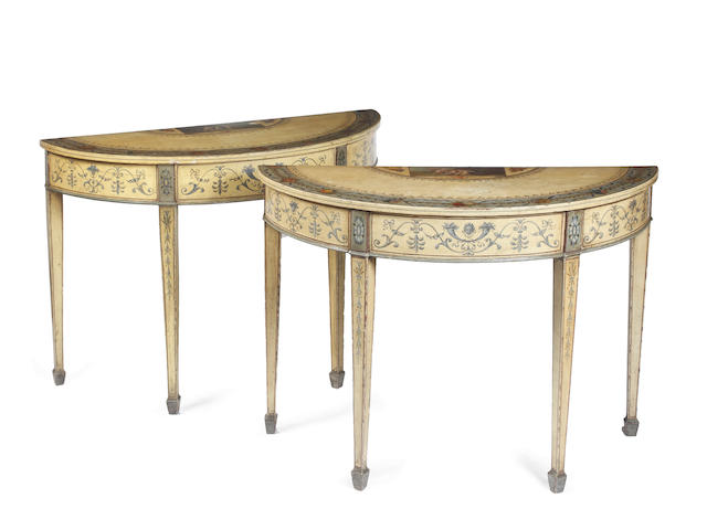 A pair of George III style cr&#232;me painted 'D' end tables
