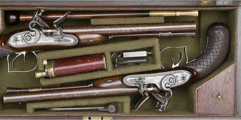 A Rare Pair Of Cased 25-Bore D.B. Flintlock Carriage Pistols