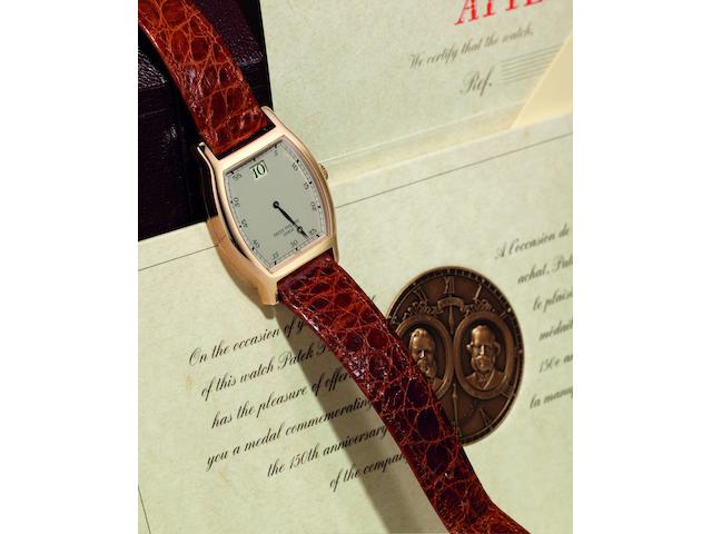 Patek Philippe. A fine and rare limited edition 18ct rose gold manual wind wristwatch with jump hour  150th Anniversaire 1839-1989, Ref:3969, Case No.2864547, Movement No.752534, Sold 1st July 1989