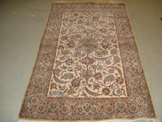 An Isfahan rug, Central Persia, 178cm x 106cm signed