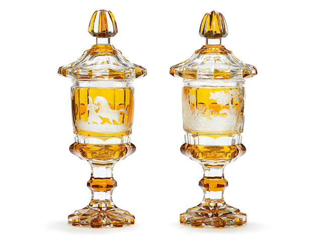 A pair of Bohemian part-amber-stained goblets and covers probably by August B&#246;hm, Meistersdorf, circa 1840-50