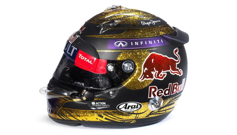 A signed Sebastian Vettel helmet by Arai, used during the race weekend at the German Grand Prix, Nurburgring, 2013,