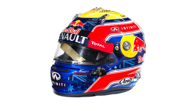 A signed Mark Webber helmet by Arai, used during the race weekend at the Italian Grand Prix, Monza, 2013
