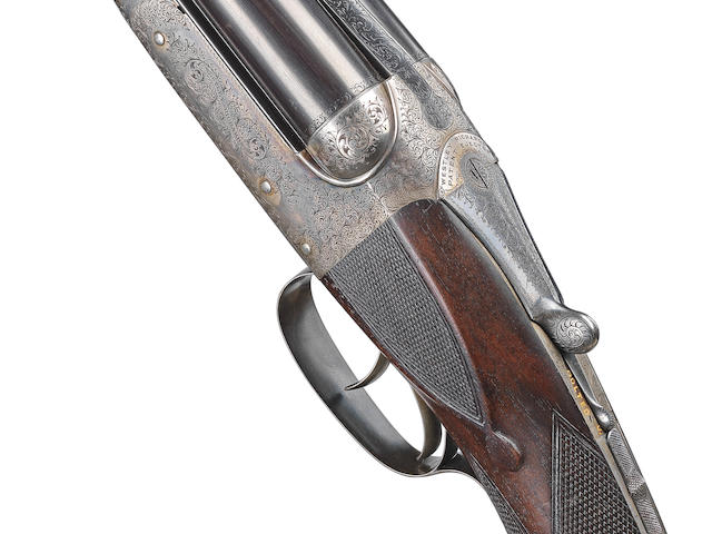 A fine .303 boxlock ejector rifle by Westley Richards, no. 15686 In a Westley Richards brass-mounted oak and leather case