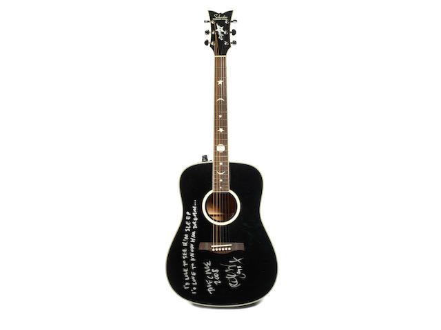 The Cure: A Schecter RS 1000 guitar in black gloss finish owned and played by Robert Smith,