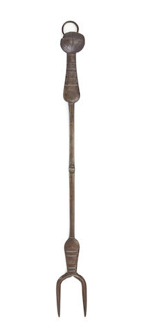 A late 17th/early 18th century iron two-pronged cooking or meat fork