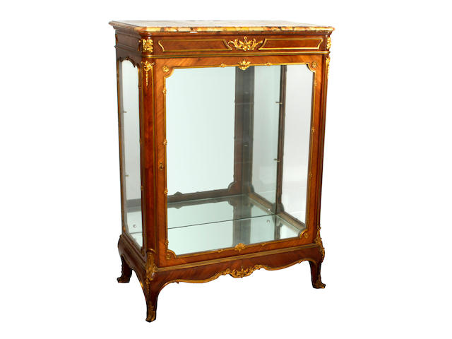 A late 19th Century Louis XVI style kingwood and gilt metal mounted glazed display display cabinet