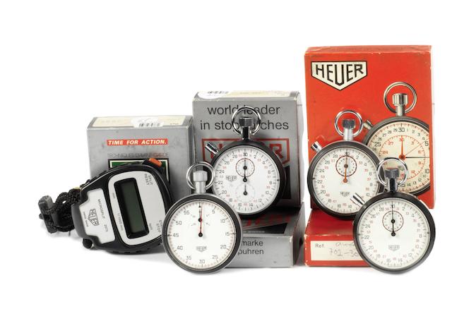 Five boxed Heuer stopwatches,