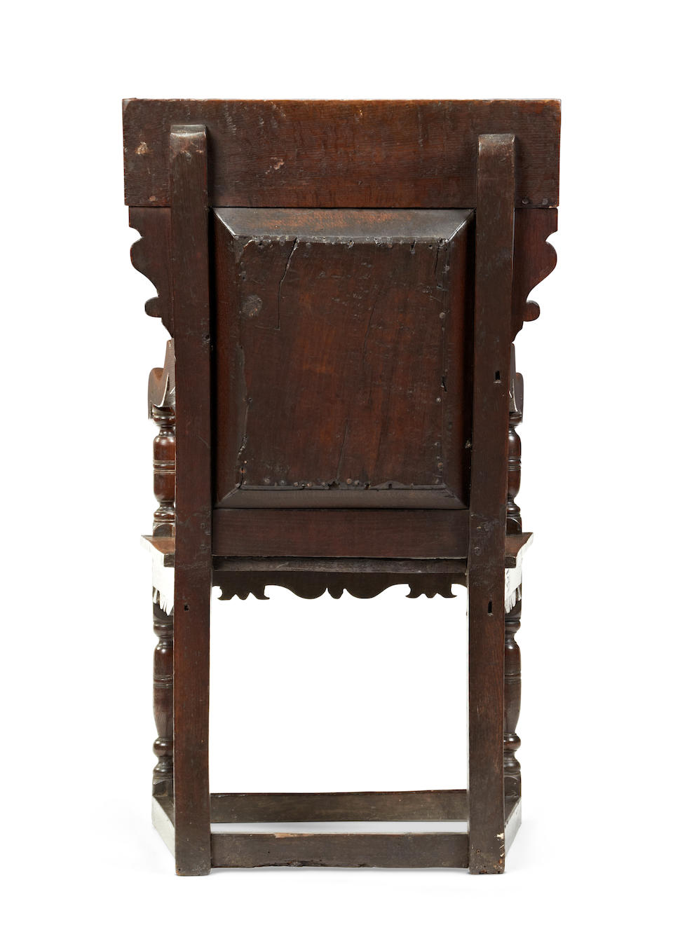 An exceptionally rare and fine early 17th century oak recessed panel-back open armchair, Somerset, circa 1620-30