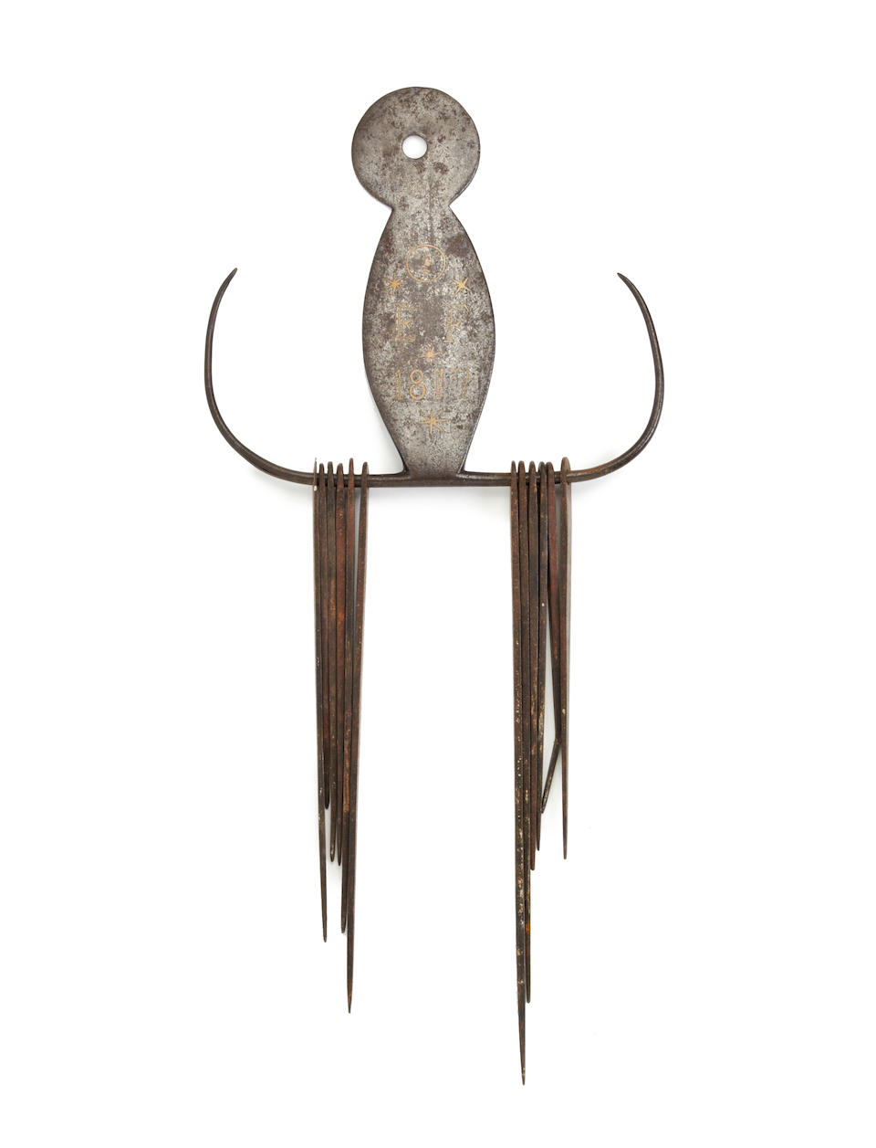 A rare Regency brass-inlaid wrought iron or steel skewer holder, dated 1817, with ten skewers