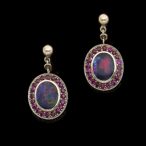 Bonhams : A pair of opal and ruby pendent earrings