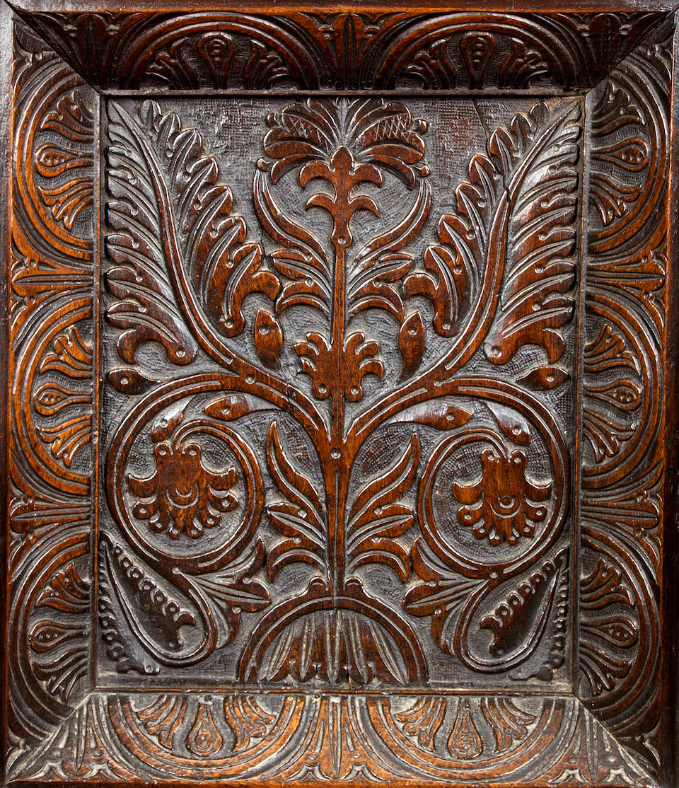 An exceptionally rare and fine early 17th century oak recessed panel-back open armchair, Somerset, circa 1620-30