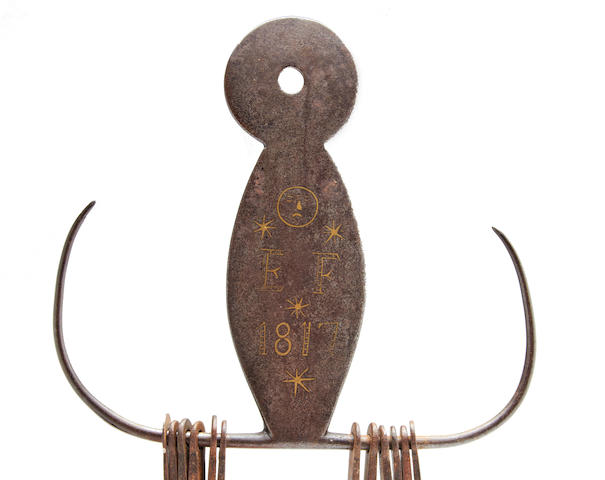 A rare Regency brass-inlaid wrought iron or steel skewer holder, dated 1817, with ten skewers