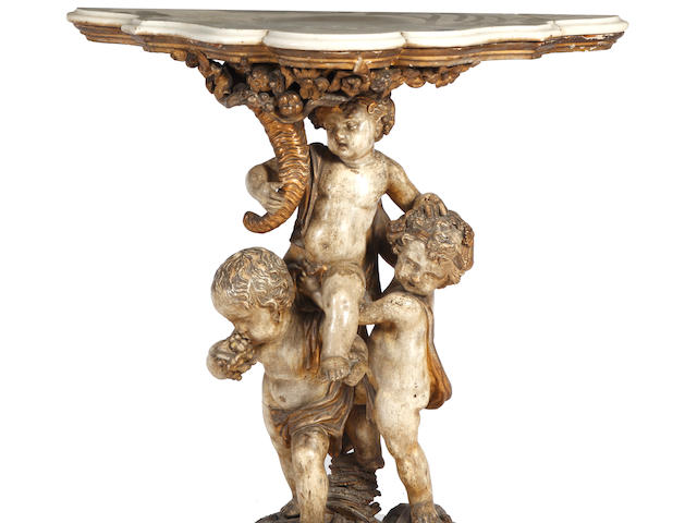 An Italian marble top console table