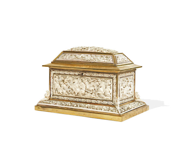 A Continental late 19th century carved ivory and polished brass mounted table casket probably German