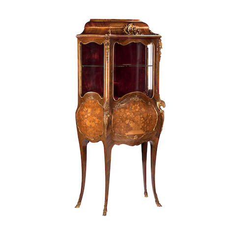A late 19th/early 20th century walnut and ormolu mounted secretaire vitrine