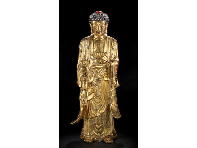 A very rare monumental gilt-lacquer porcelain figure of Buddha Qing Dynasty