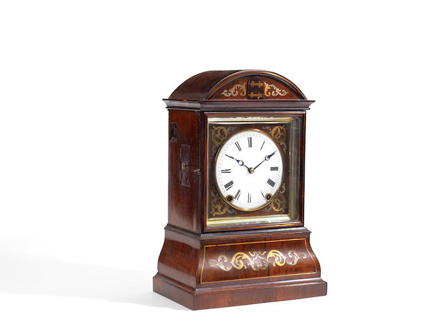 A mid 19th century German rosewood and brass inlaid mantel cuckoo clock the interior labelled Joh. Baptist Beha